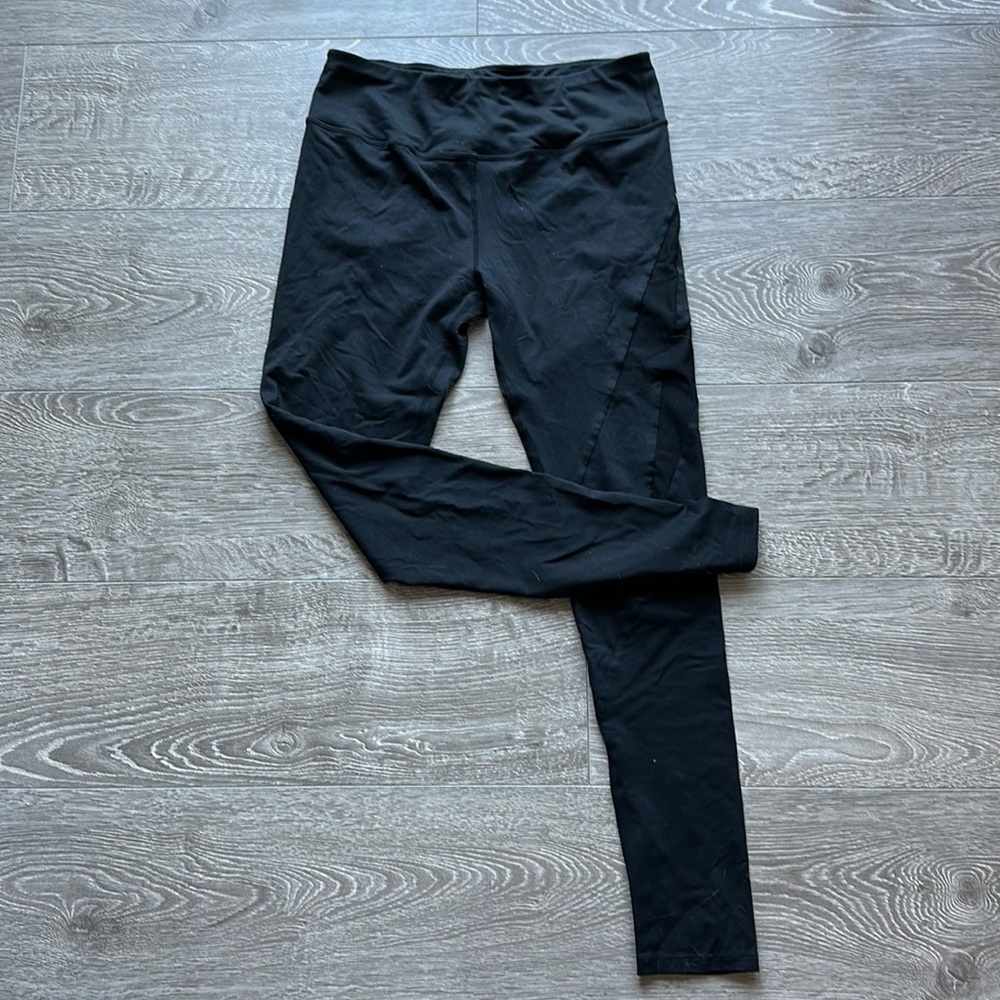 Yoga pants by Electric with sheer lightning bolt down the side.